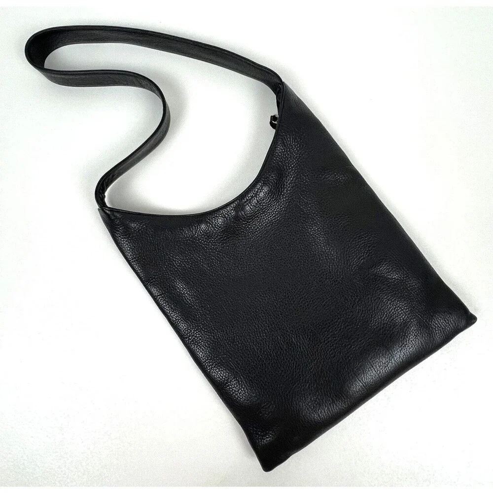 The Sak Hobo Shoulder Bag Pebbled Black Leather Pockets Signature Charm Roomy